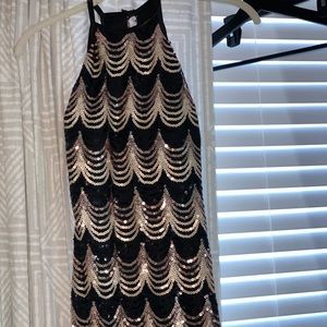 Gold and black sequin dress